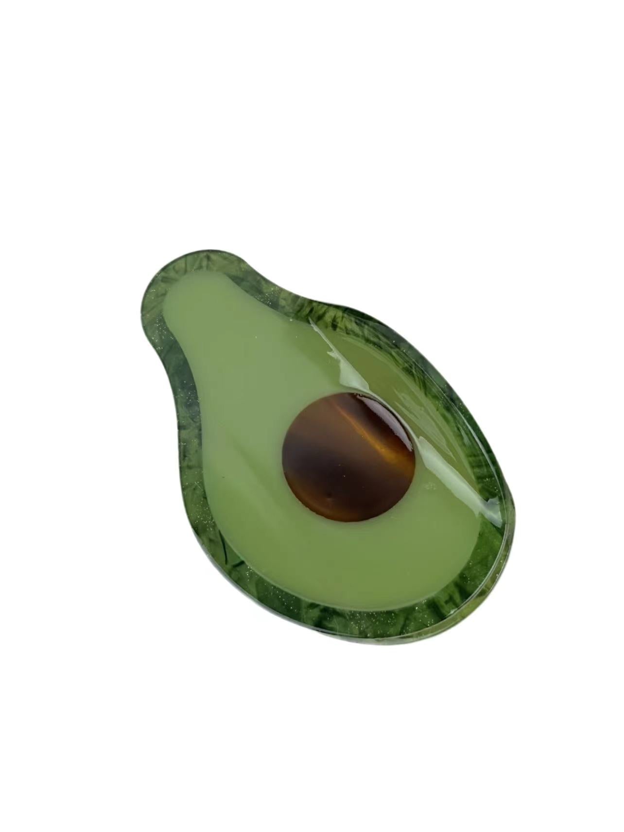 a hair claw clip made in a avocado shape